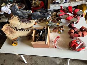 Vintage Roller Skates and Accessories Including Riedell Boots, Red Strap Skates, and Spare Wheels