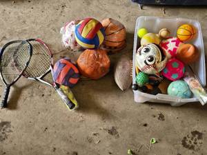 Assorted Sporting Goods Lot including Tennis Rackets, Basketballs, Volleyballs, and Footballs