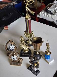 Trophies and Awards Lot Including Soccer, Softball, and Baseball Trophies