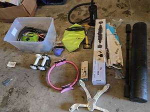 Various Exercise and Fitness Equipment including Mobility Wall Pro Series, Pilate Ring, and Dumbbells