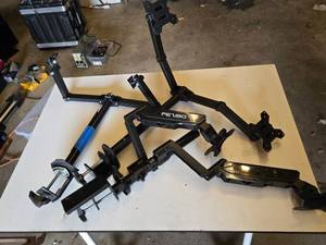 FEZIBO Dual Monitor Arm Stand with Clamps and Adjustable Mounts - Unsure if Complete