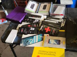 Lot of Phone Accessories including Jetech Tempered Glass Screen Protectors, Evutec Cases, and Rescue Tempered Glass for Various Devices