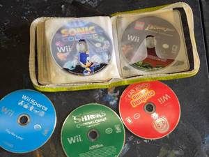 Large Nintendo Wii Video Game Collection Including Sonic Colors, Mario Kart Wii, and More