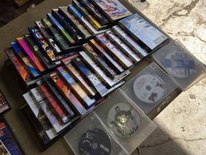 Collection of DVDs including Spider-Man, Fantastic 4, and The Incredible Hulk