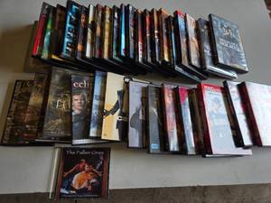 Lot of DVDs including Sherlock Holmes, The Incredibles, and The Matrix Collection