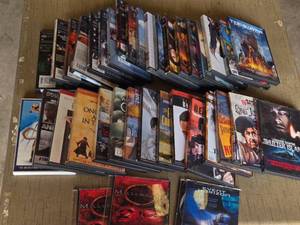 Collection of DVD Movies and TV Shows including Terminator Genisys, Shutter Island, and Millennium Series