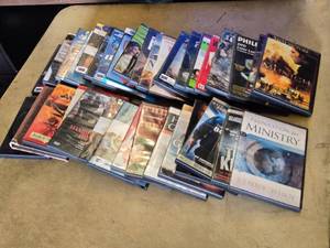 Lot of DVDs including Munich, The Bourne Identity, and Shutter Island among others