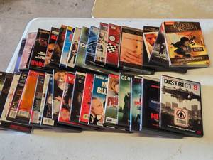 Lot of DVDs including District 9, American Beauty, and The Legend of Korra Book Two Spirits and more