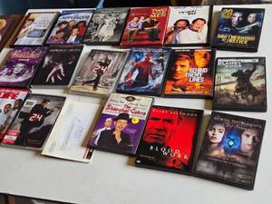 Lot of DVDs and TV Series Box Sets including The Carol Burnett Show, The Jeffersons, Two and a Half Men, 24, and The Mortal Instruments City of Bones among others