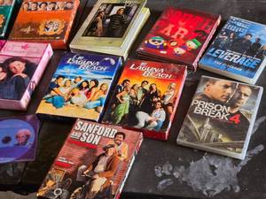 Collection of DVD Box Sets including Friends, Gilmore Girls, and Prison Break