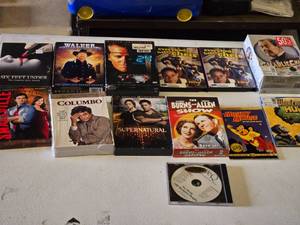 DVD and CD Collection including Six Feet Under Season 1, Walker Texas Ranger Season 2, and Supernatural Season 8