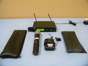 Shure SLX4 Professional Wireless Receiver with SLX-1 Wireless Bodypack Transmitter, Shure SM58 Handheld Microphone / Mic, Lapel / Lavalier Mic and (2) Shure Soft-Sided Cases