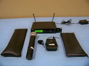 Shure SLX4 Professional Wireless Receiver with SLX-1 Wireless Bodypack Transmitter, Shure SM58 Handheld Microphone  Mic with SLX2, Lapel  Lavalier Mic and (2) Shure Soft-Sided Cases