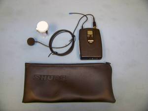 Shure ULX1-G3 Wireless Bodypack Transmitter with Lapel  Lavalier Microphone  Mic and Shure Soft-Sided Bag
