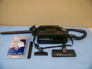 Oreck XL Commercial Cannister Bagged Vacuum with Attachments and Replacement Bags