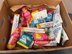 Box Of Variety Toothpaste And Supplements