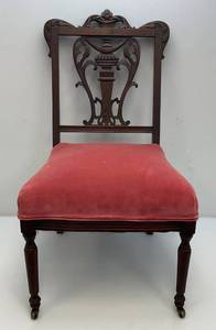Victorian Carved Walnut Chair With Brass Wheels On Front legs (Nice Condition)