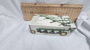 John Deere Four Bottom Plow in Box