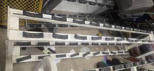 OEM Commercial Dumbbell Rock ( Used). Dimensions: 100"L x 20"W x 34"H