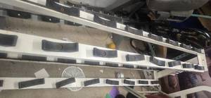 OEM Commercial Dumbbell Rock ( Used). Dimensions: 100"L x 20"W x 34"H