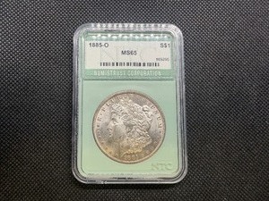 1885 O Morgan Silver Dollar NTC MS65