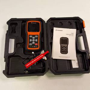 The Foxwell T1000 diagnostic tool used to activate, decode and program tire pressure (TPMS) sensor