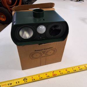 Solar-powered ultrasonic animal repeller with motion detection