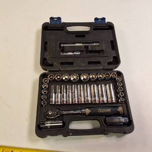 Quinn brand socket set with a ratchet and various sockets