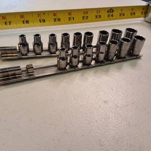 Lot of 16 Snap-on  12-point, shallow metric socket set mounted on a metal rails