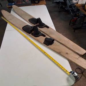 Vintage wooden water skis, a classic recreational combo