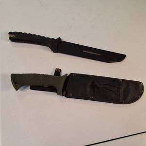 Lot of two tactical machetes with sawback spines plus sheaths