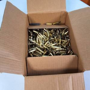 Large box with a huge quantity of empty brass cartridge casings