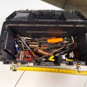 Plastic tool box chock full of tools