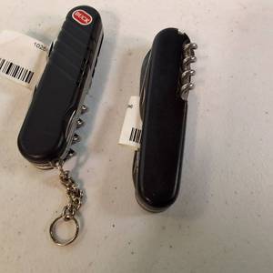 Lot of vintage multi-tool pocket knives and keychain accessories