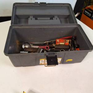 Plano 16-inch tool box with a variety of assorted hand tools and hardware.