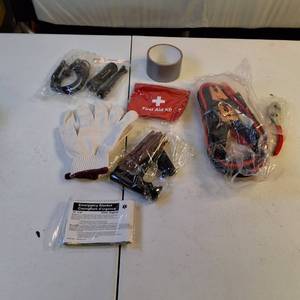 Emergency roadside assistance and first aid kit