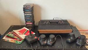 LL - Atari CX-2600 A Video Computer System with Paddles & Joysticks, Cartridges & Manuals