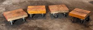 G - Four Wooden Moving Dollies