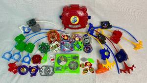 Beyblade Collection includes Battle Dome, String Launchers, Beyblades and Hard Metal System Case