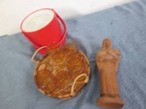 Basket of glasses, wood figure and ...