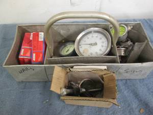 Tool box full of guages, screws and...