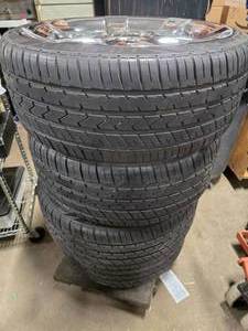 (4) 235/35ZR20 Tires on 20" 7 Spoke Chrome Wheels