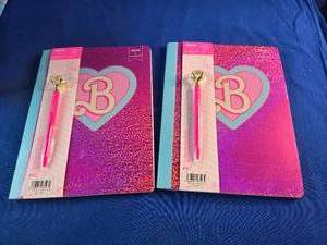 2 Composition book with pen