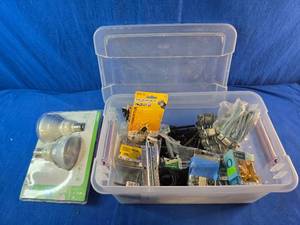 Bin of Assorted Hardware, Nuts, Bolts Hinges Etc. and Pack of 65 Watt Bulbs