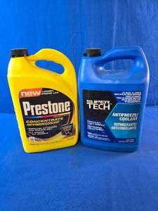 (2) Gallon Jugs of Antifreeze, Both Open but are Close to Full