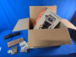 Mystery Box of Assorted Items, Chefman Coffee Maker, Charging Adapters, Power Strip, Etc.