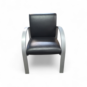 Alera MetaLounge Series guest chair featuring a black vinyl seat and back with a silver metal frame.