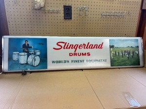 Vintage advertisement sign for Slingerland drums, historically manufactured in Chicago and Niles, Illinois