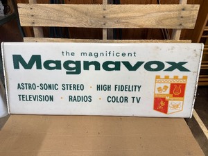 Vintage lighted advertising sign for Magnavox electronics.