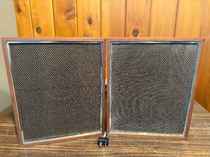 Vintage loudspeakers, likely Jensen 3-P 1 slim shelf models based on their distinctive wooden frames and mesh grill pattern  LIKELY